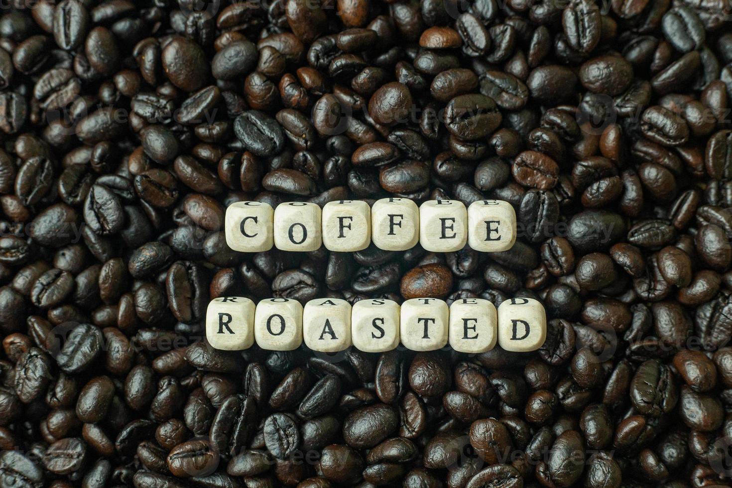 coffee roasted and text wood cube close up image. photo