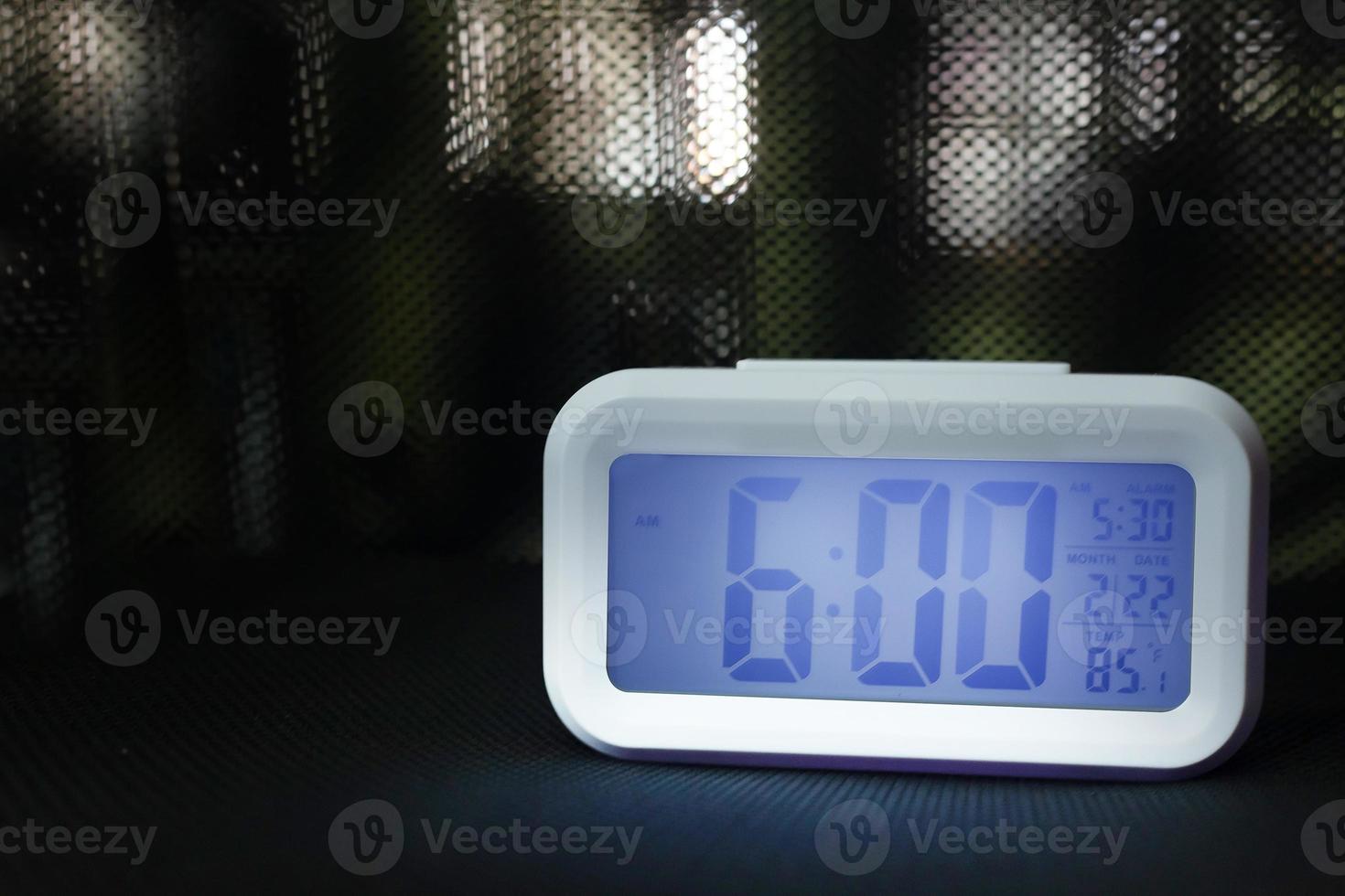 Digital alarm clock  6am close up image. photo
