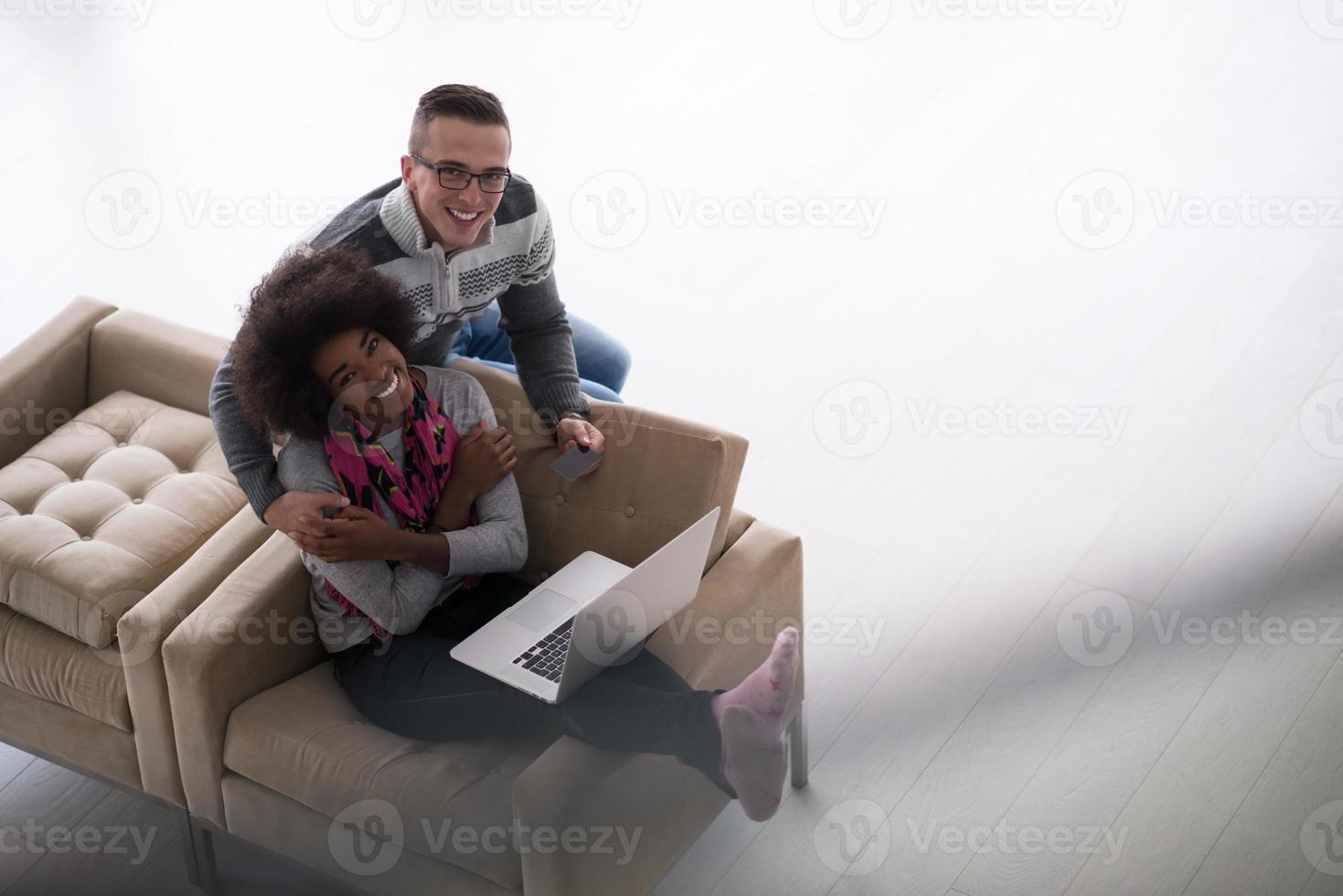 multiethnic couple shopping online photo