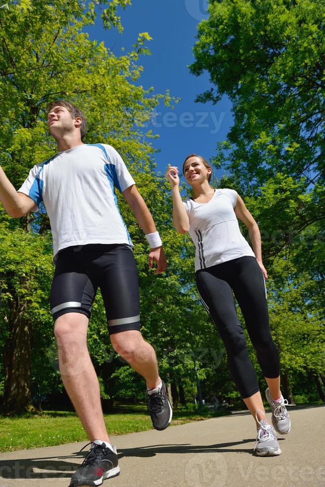 Young couple jogging photo