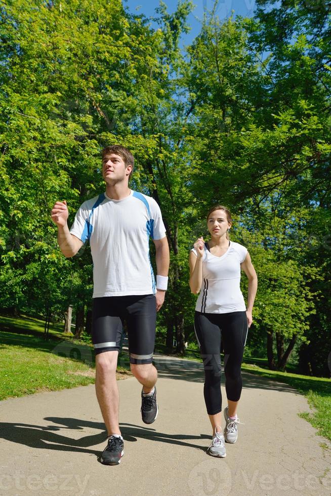 Young couple jogging photo