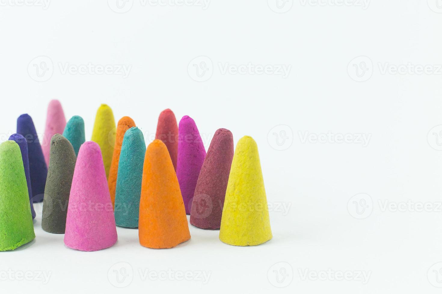 Incense Cone in a stand with the feather for background. photo