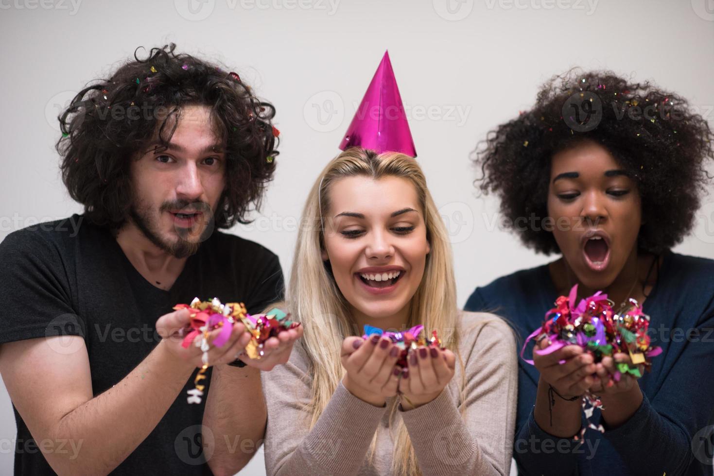 confetti party multiethnic group of people photo