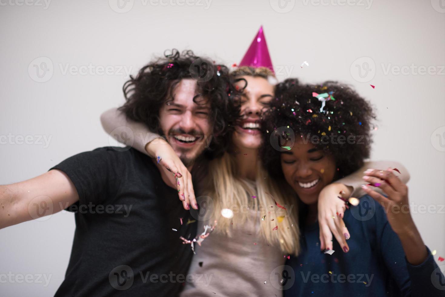 confetti party multiethnic group of people photo