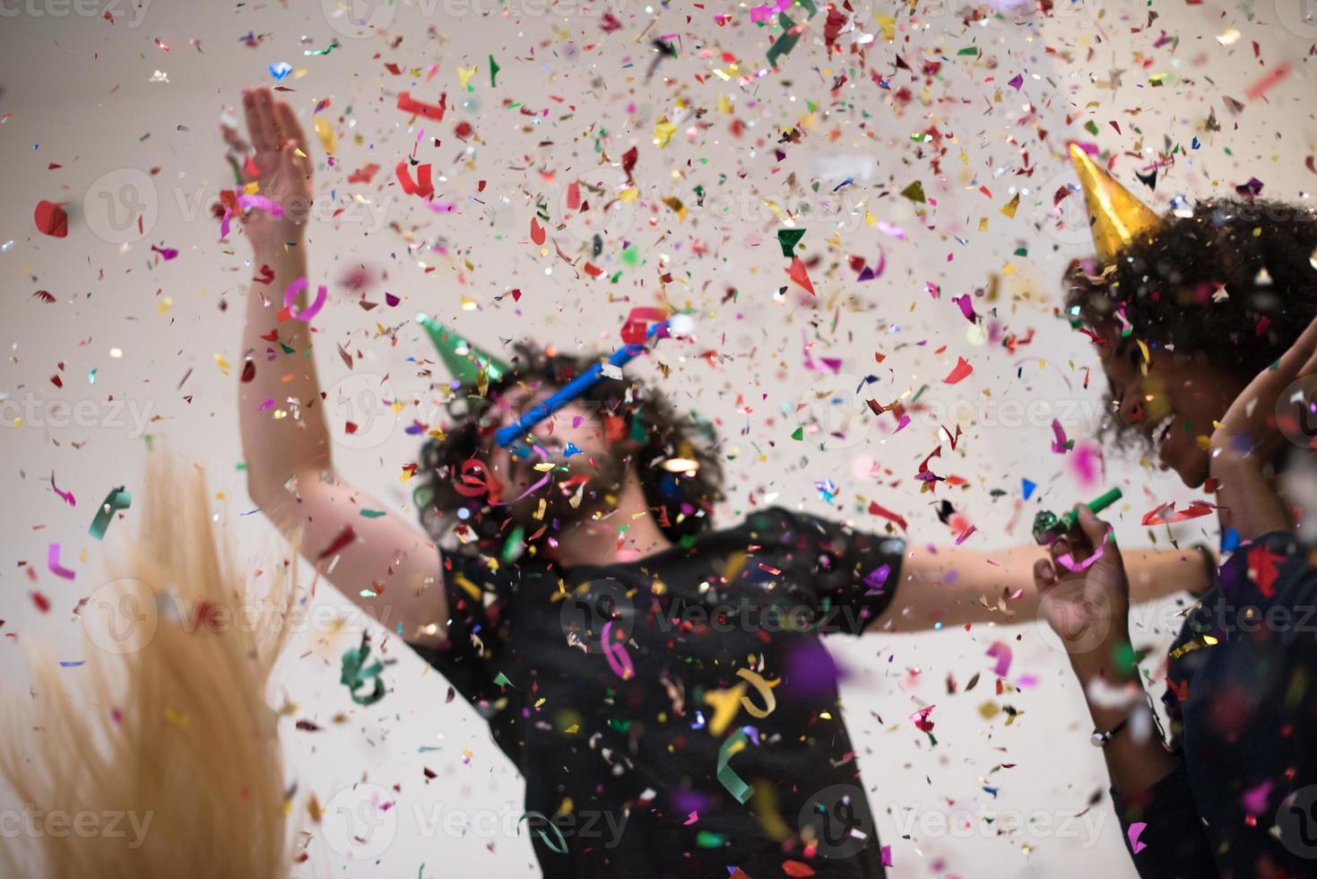 confetti party multiethnic group of people photo