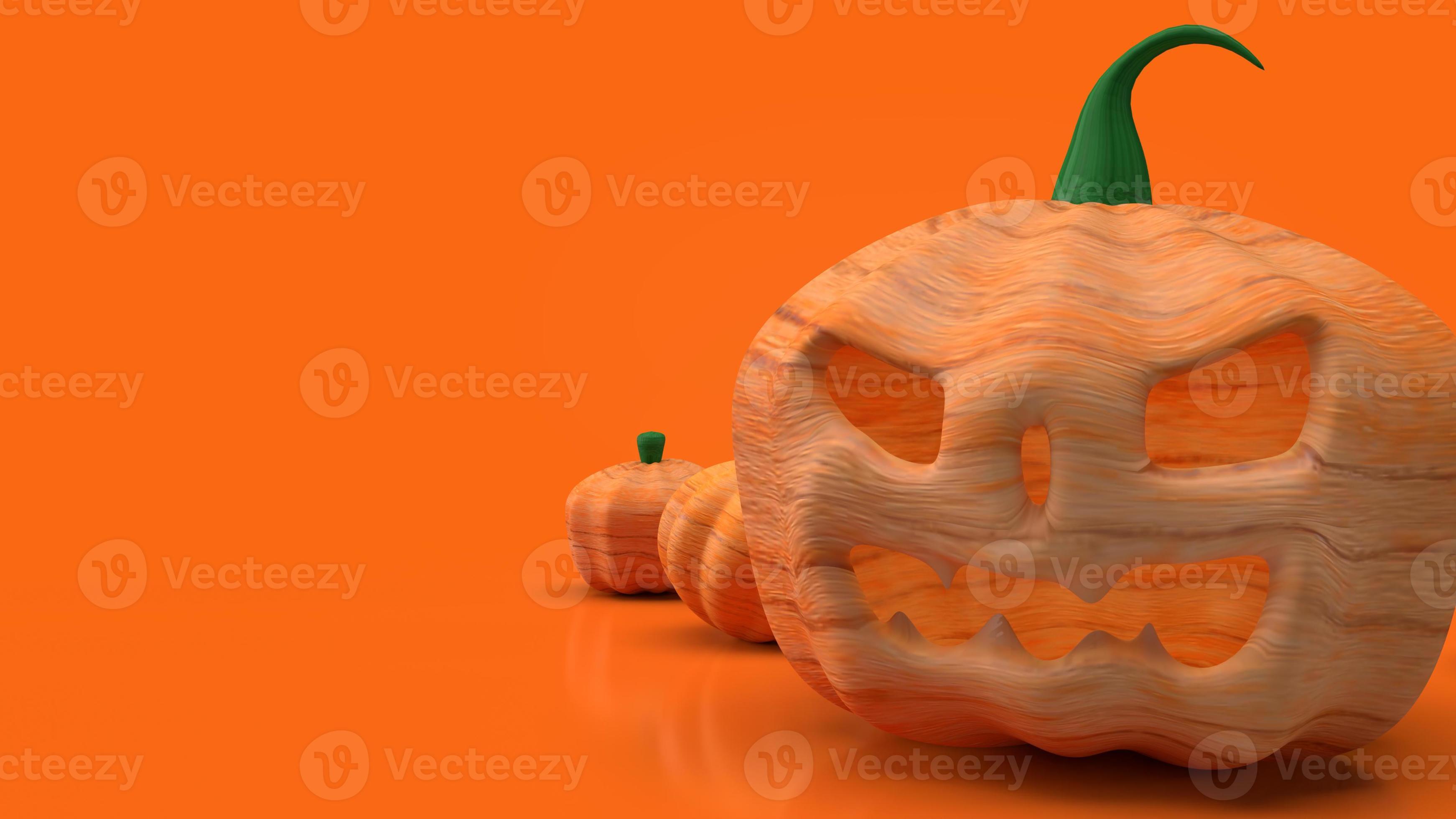 The jack o lantern and pumpkin on orange background for halloween