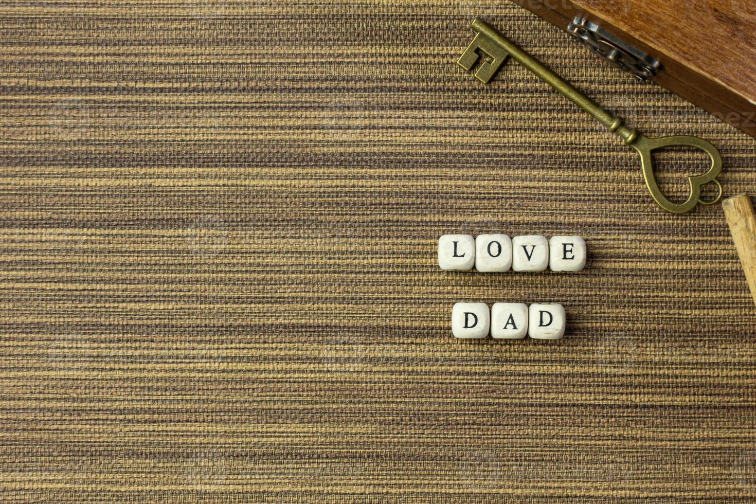 wooden text  for father day content close up image. photo
