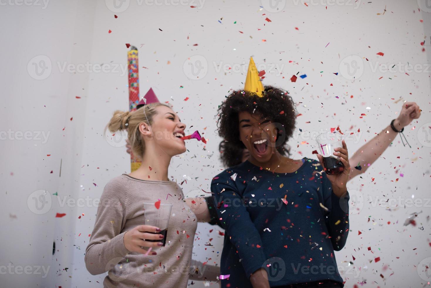 confetti party multiethnic group of people photo