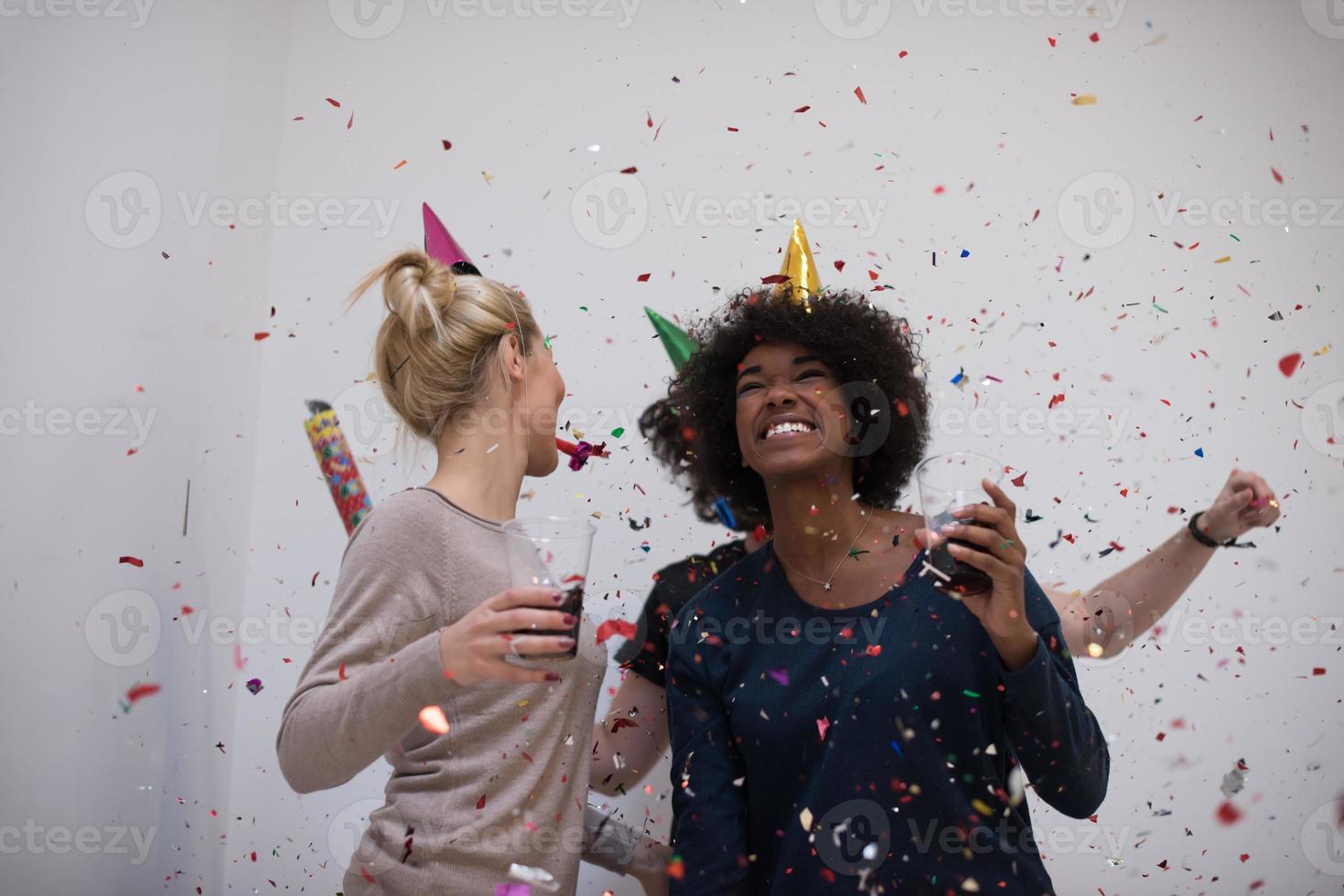 confetti party multiethnic group of people photo