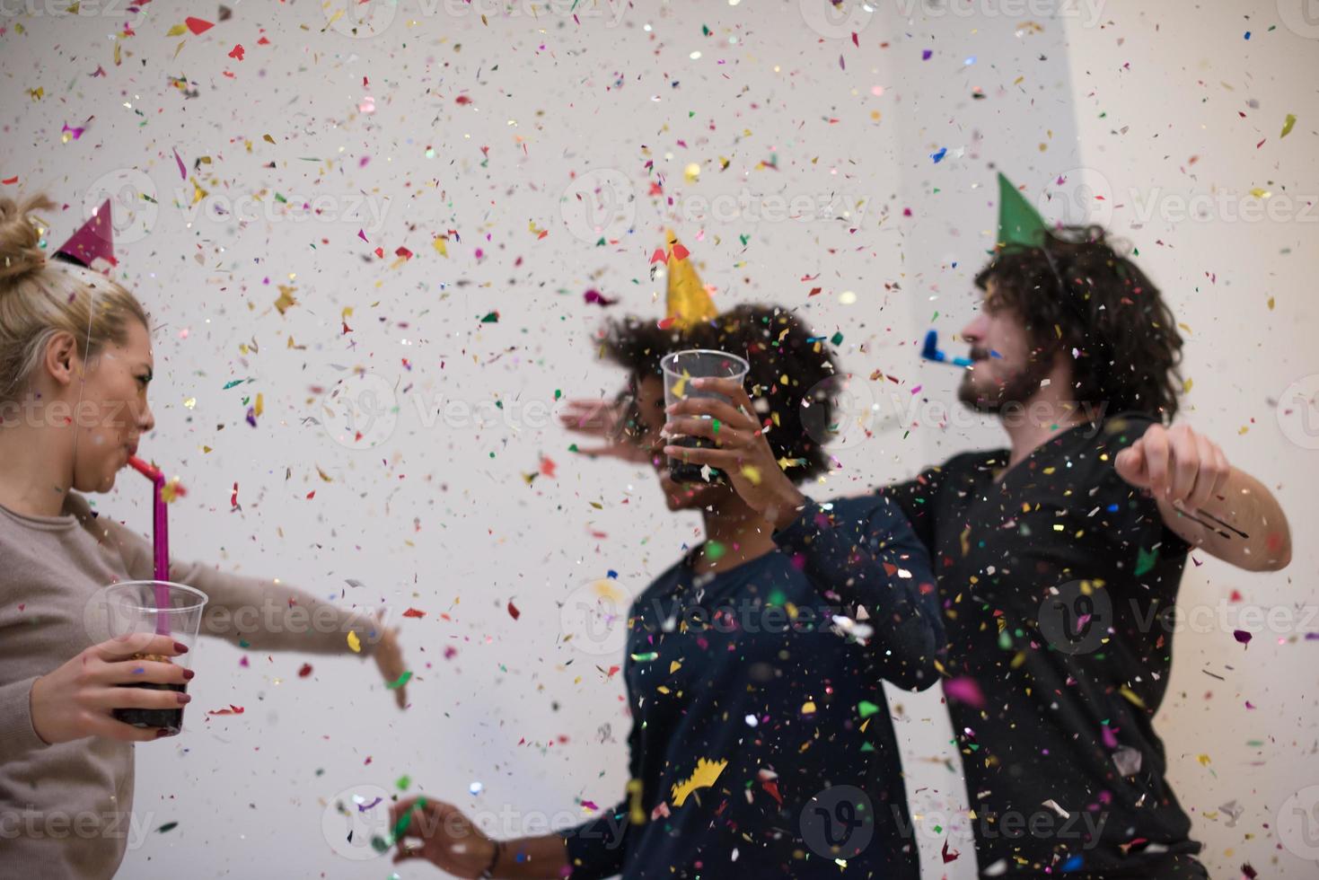 confetti party multiethnic group of people photo