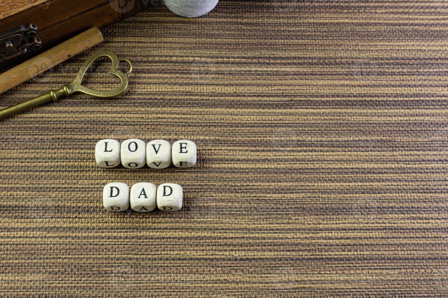 wooden text  for father day content close up image. photo