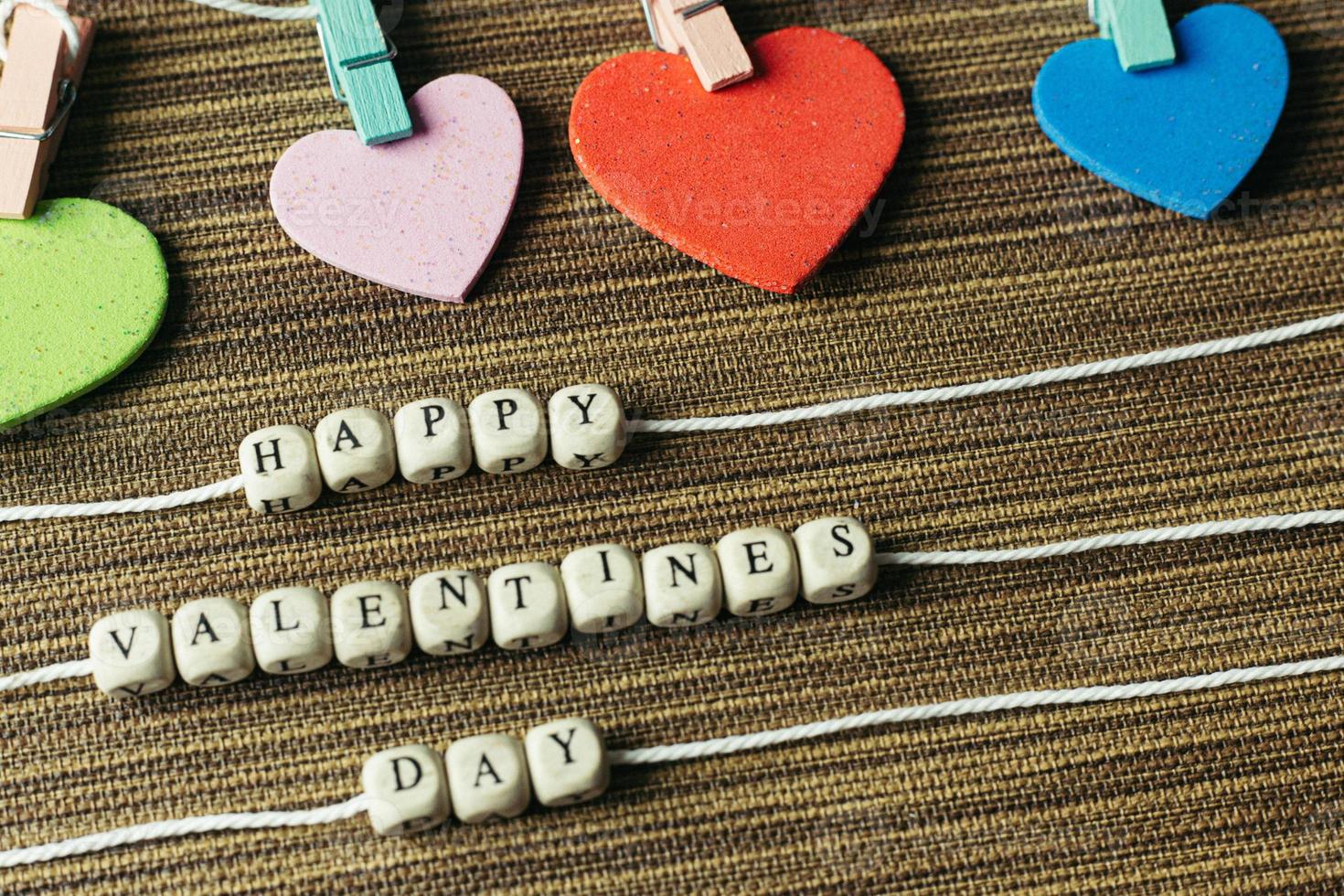 a text wood cubes image for valentines day content. photo