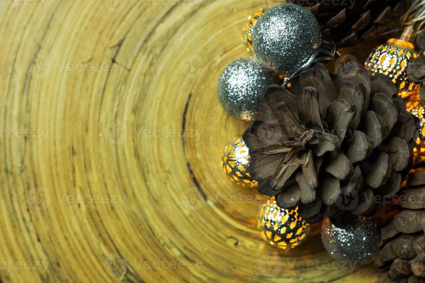 christmas ball and Pine cones  on wood  background. photo
