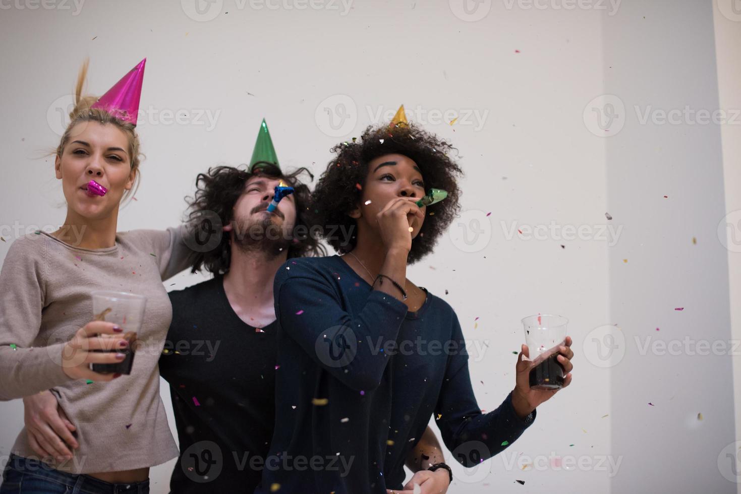 confetti party multiethnic group of people photo