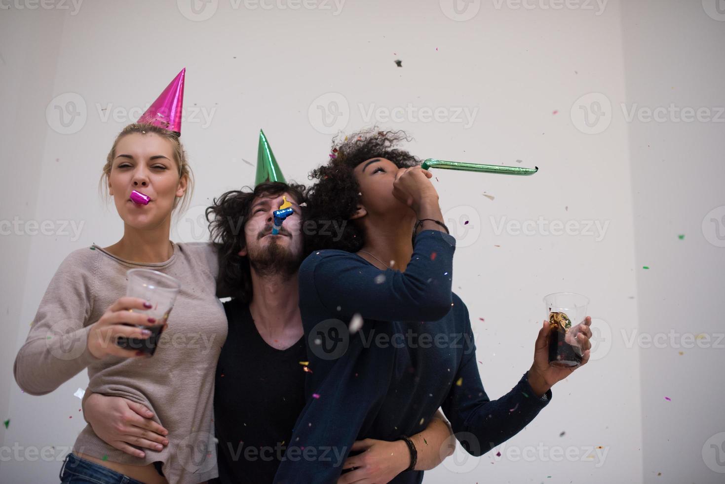 confetti party multiethnic group of people photo