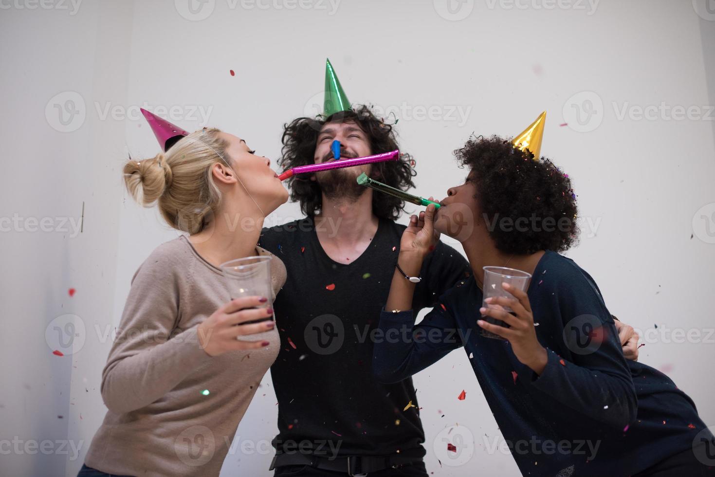 confetti party multiethnic group of people photo