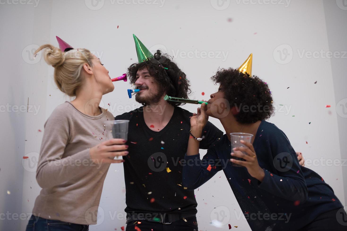 confetti party multiethnic group of people photo