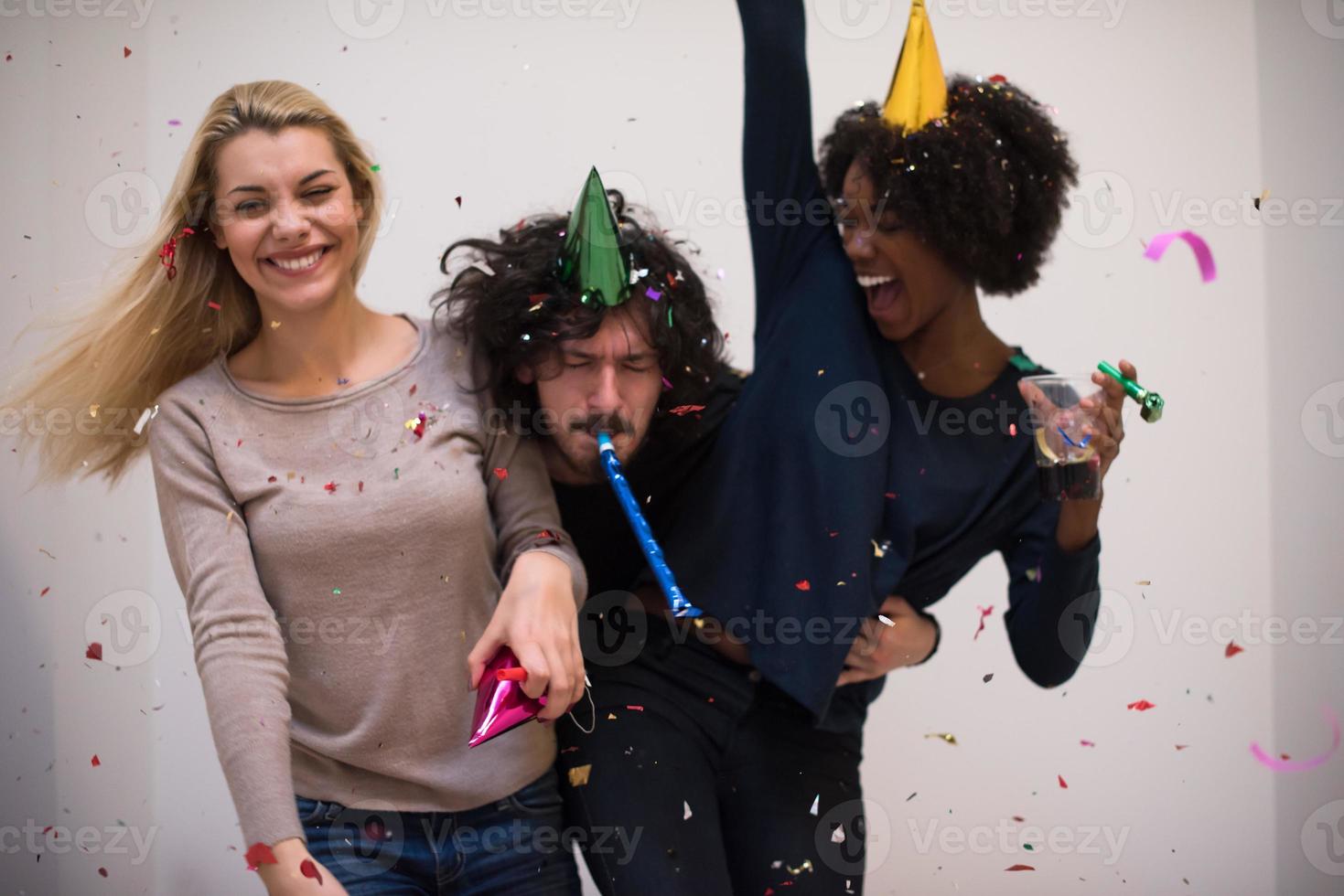 confetti party multiethnic group of people photo