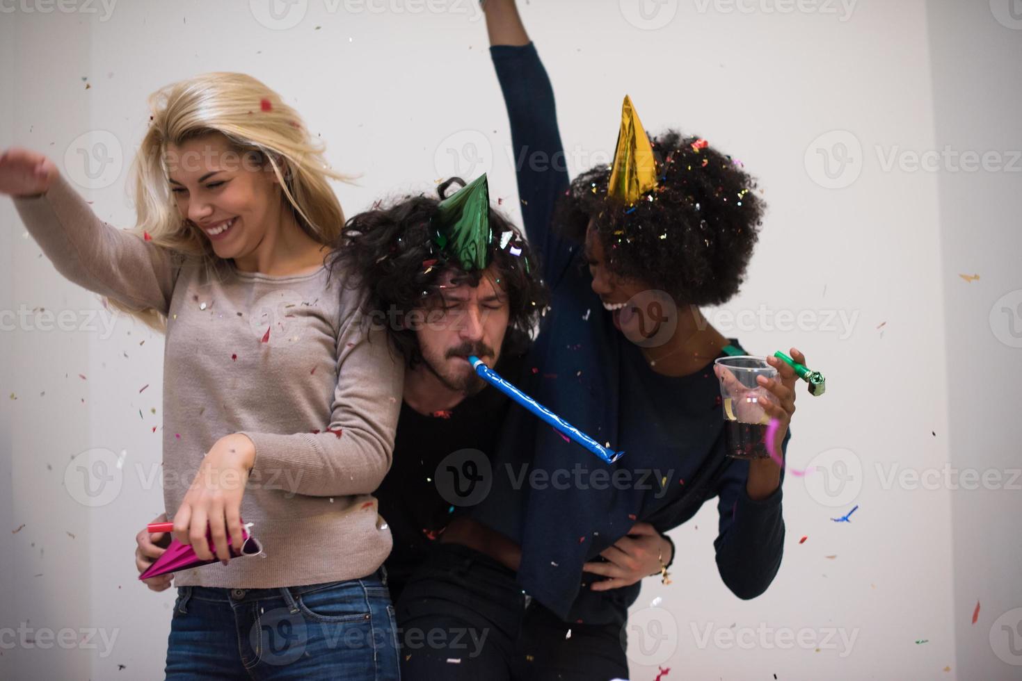 confetti party multiethnic group of people photo