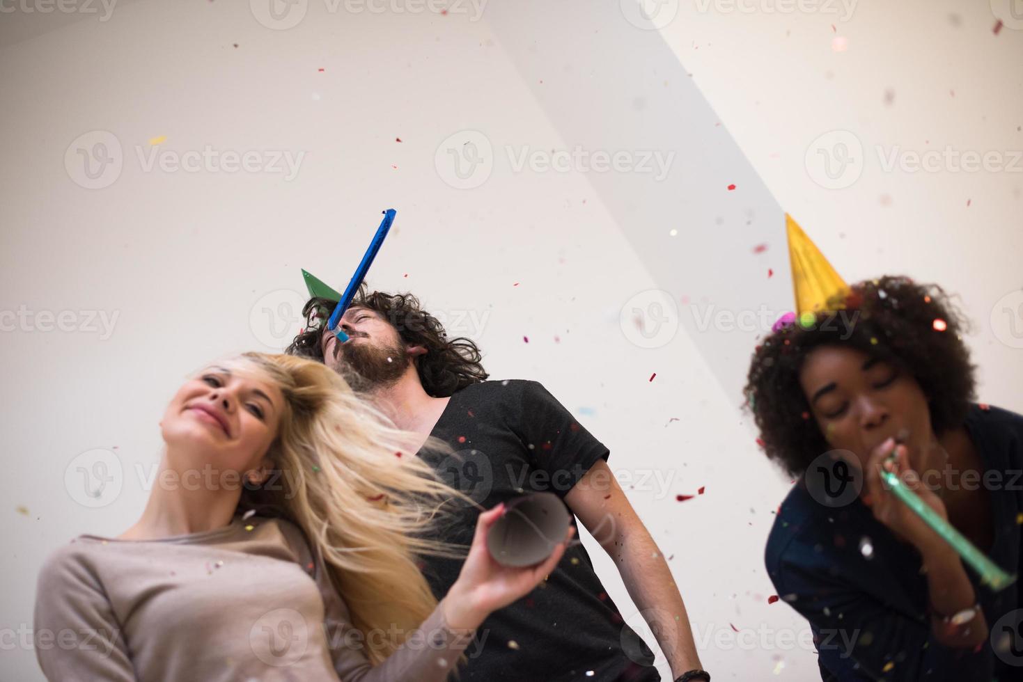 confetti party multiethnic group of people photo