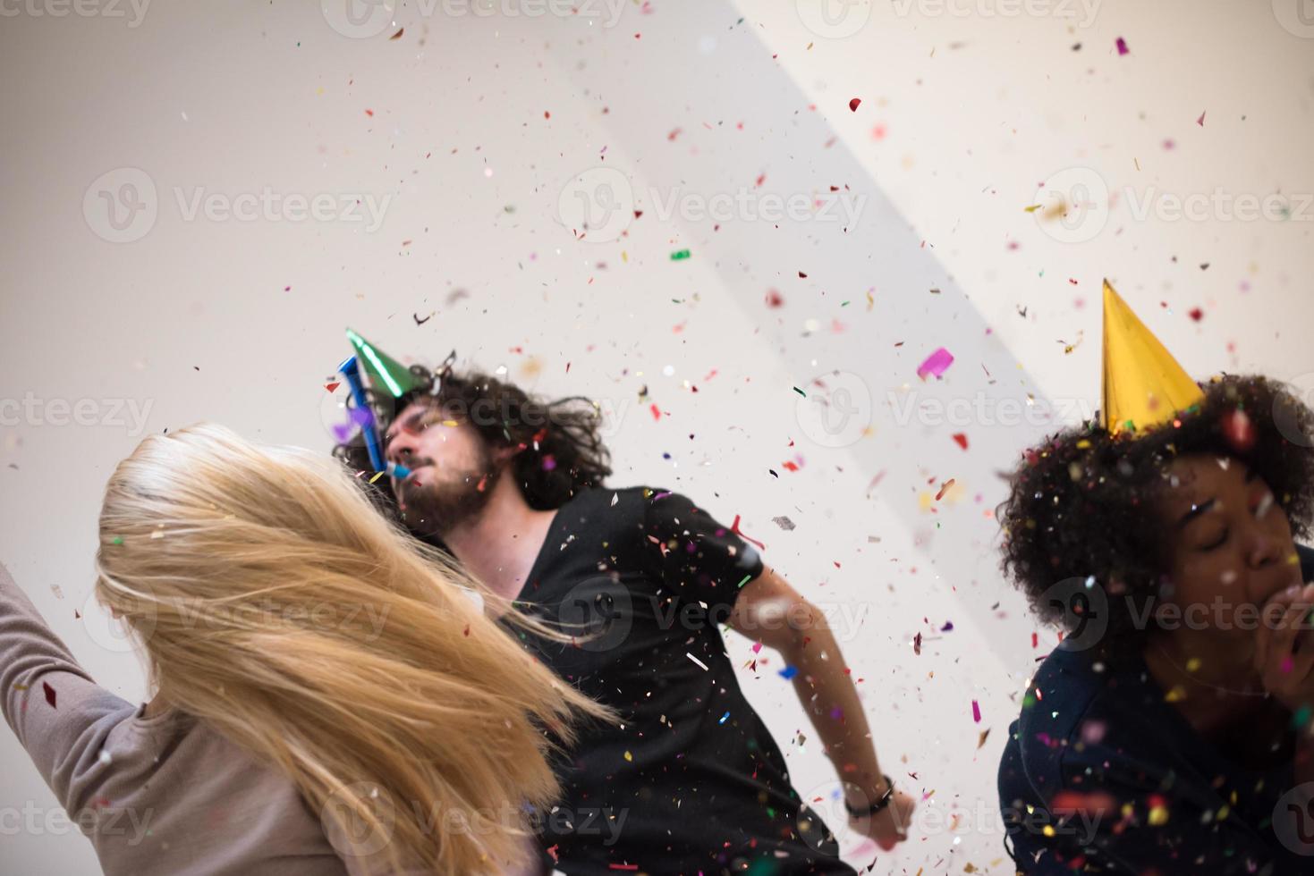 confetti party multiethnic group of people photo