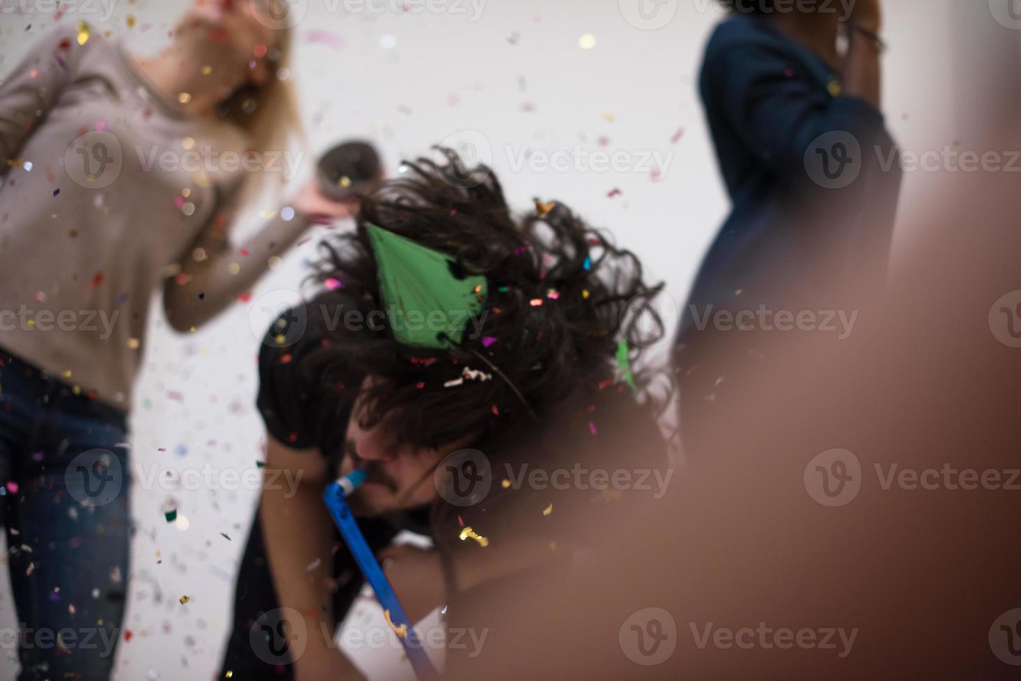 confetti party multiethnic group of people photo