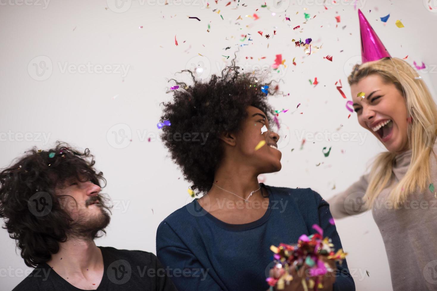 confetti party multiethnic group of people photo