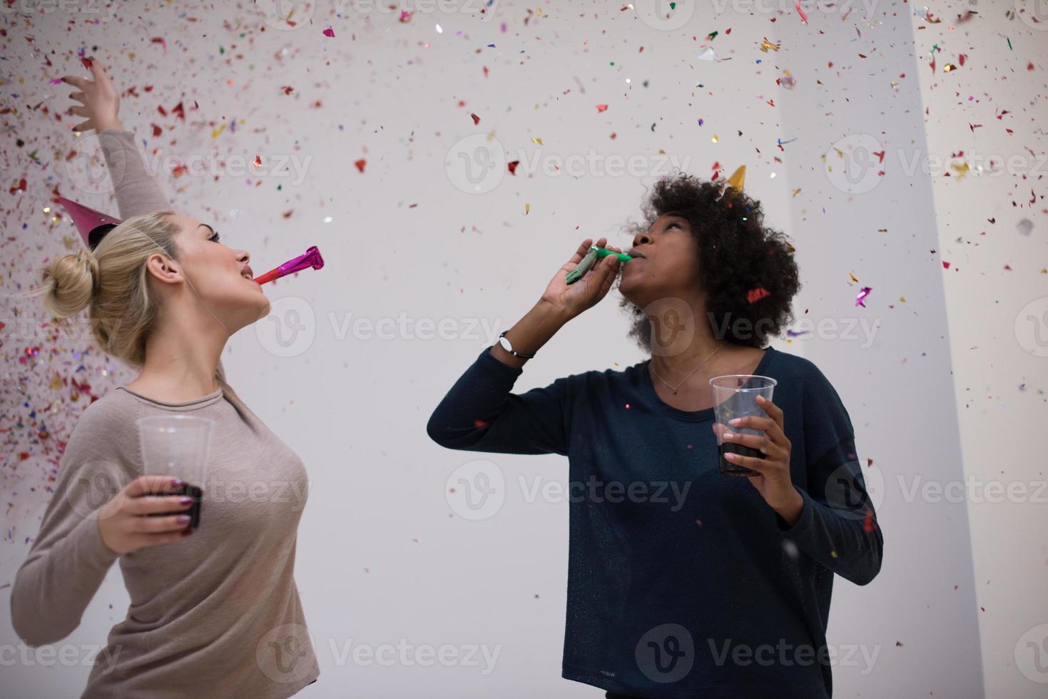 confetti party multiethnic group of people photo