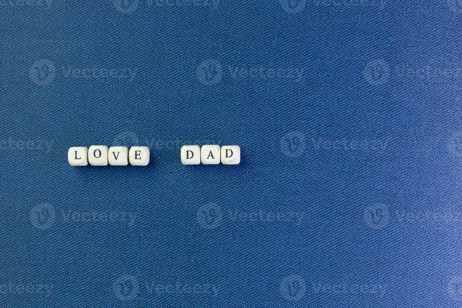 wooden text  for father day content close up image. photo