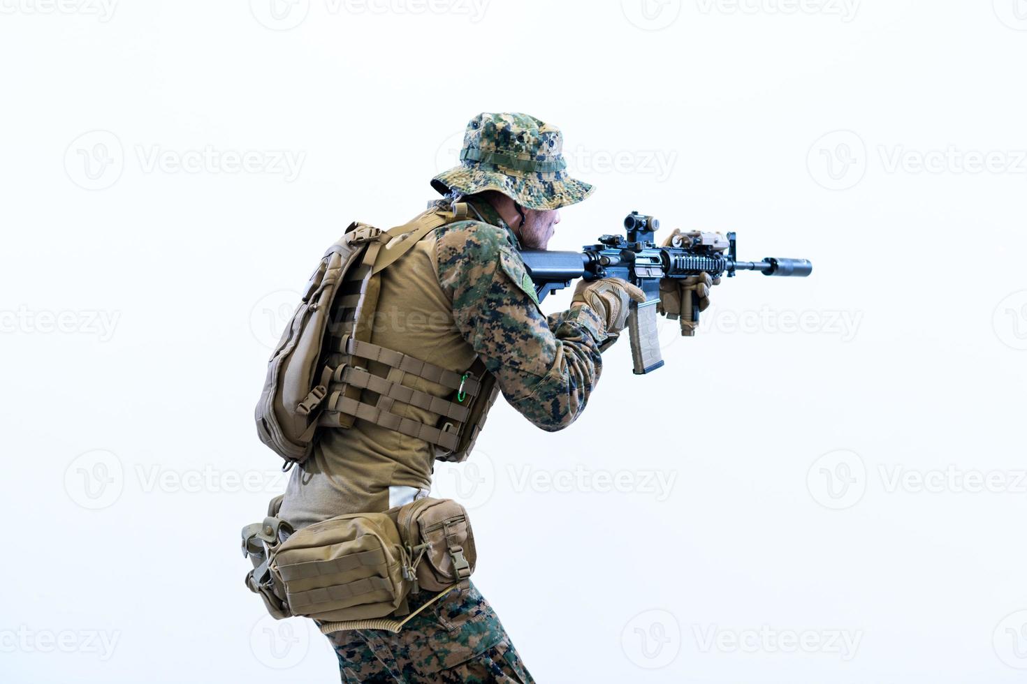 soldier in action aiming laseer sight optics photo