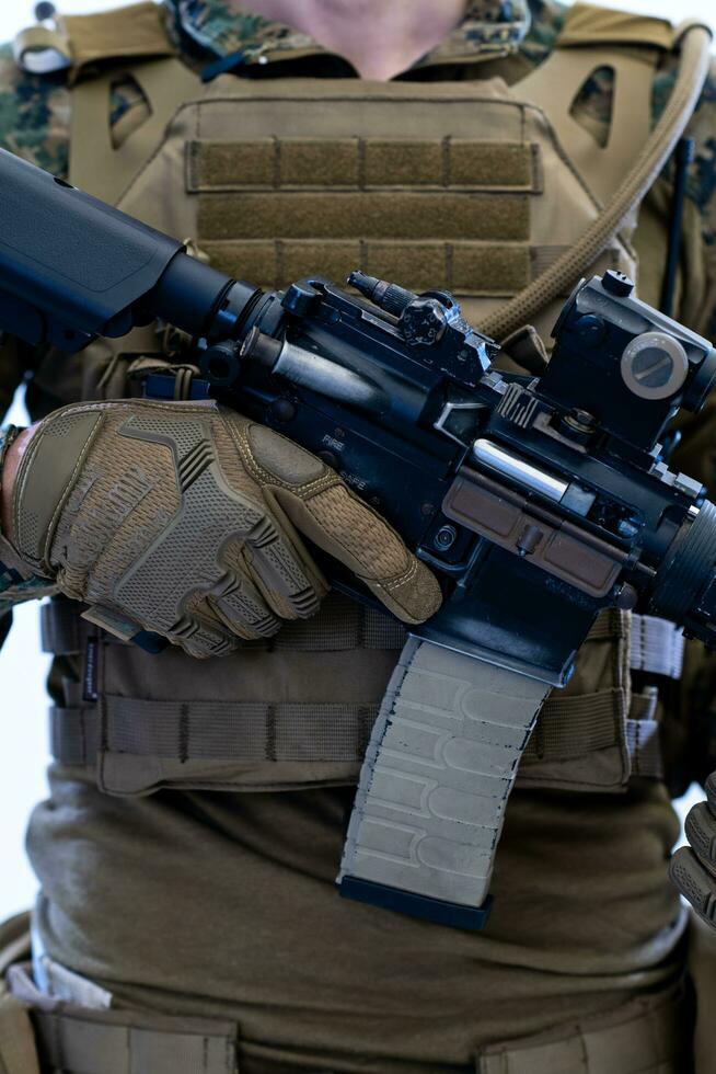 soldier preparing gear for action photo