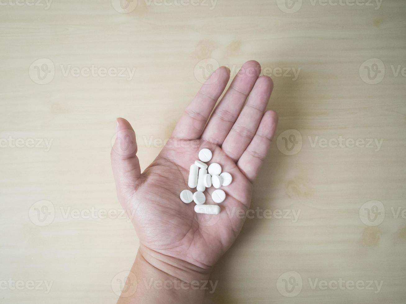 medicine close up image on wood table. photo