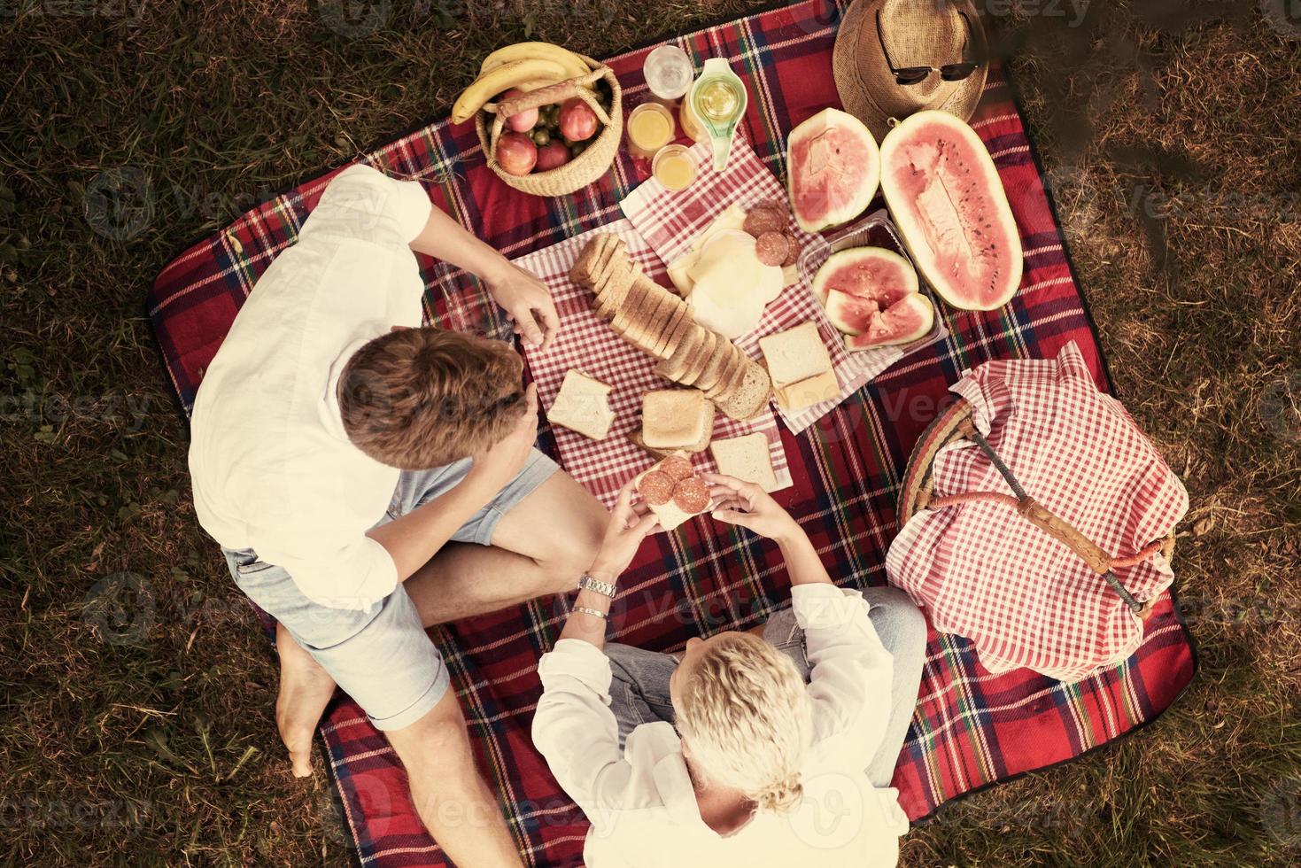 top view of couple enjoying picnic time photo