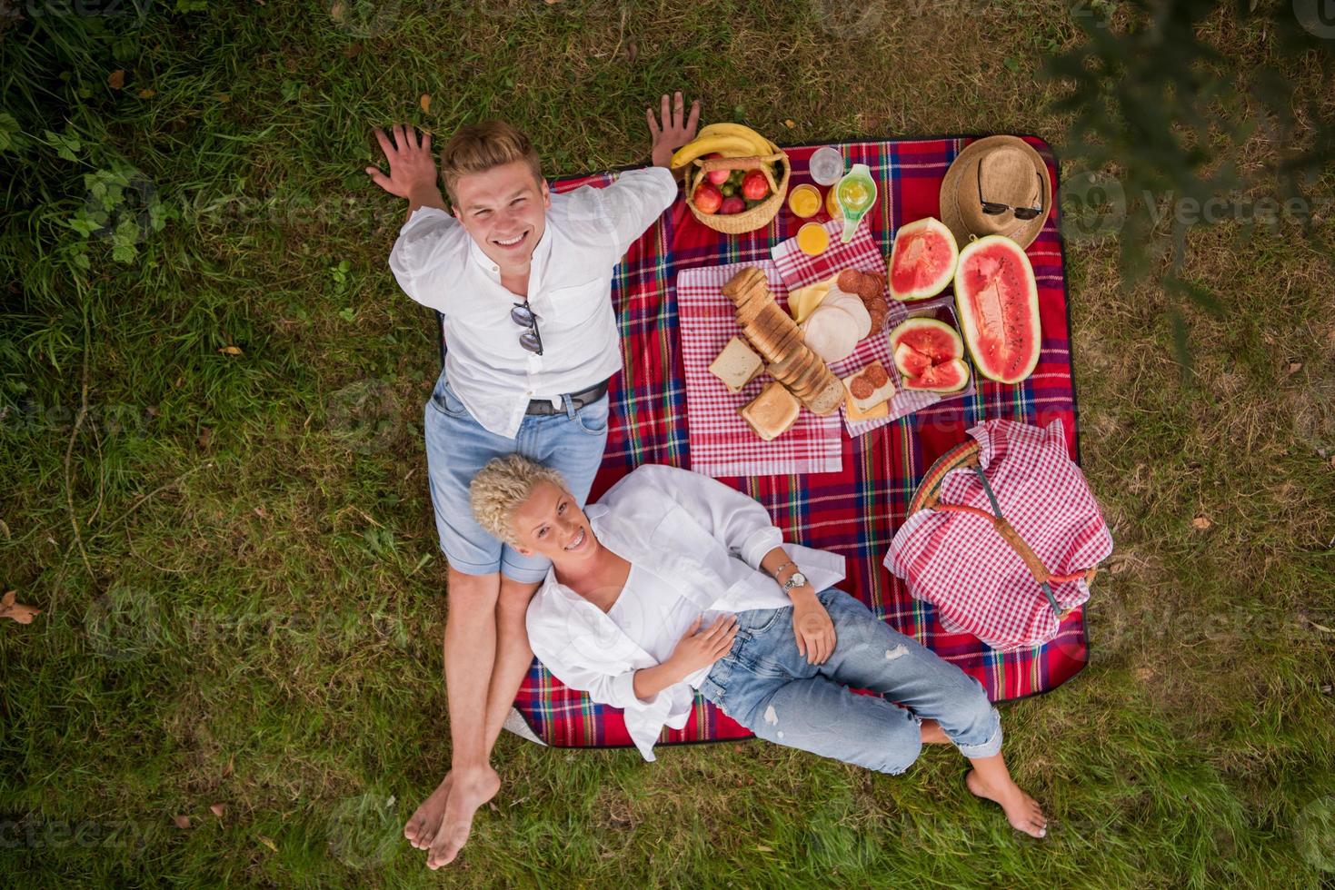 top view of couple enjoying picnic time photo