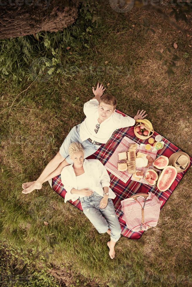 top view of couple enjoying picnic time photo