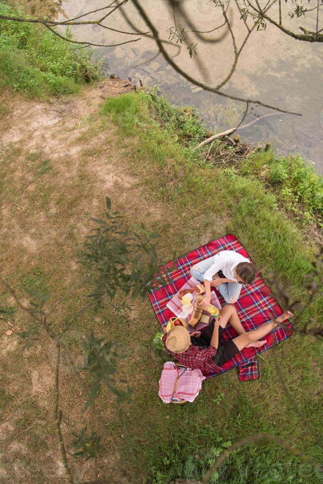 top view of couple enjoying picnic time photo