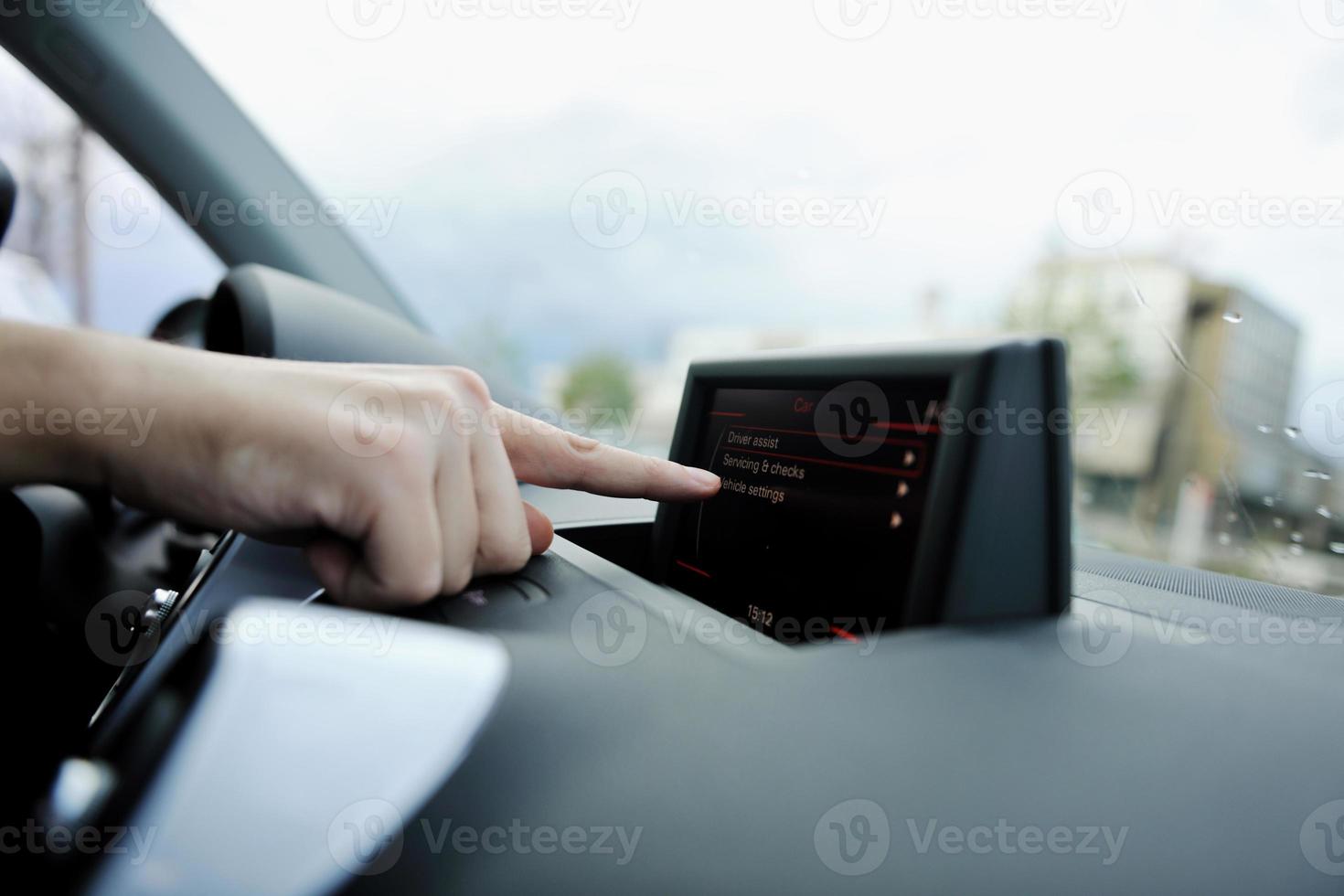 man using car navigation photo