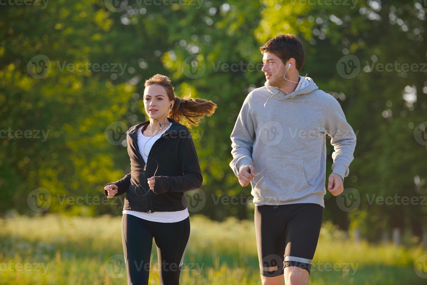 Young couple jogging photo