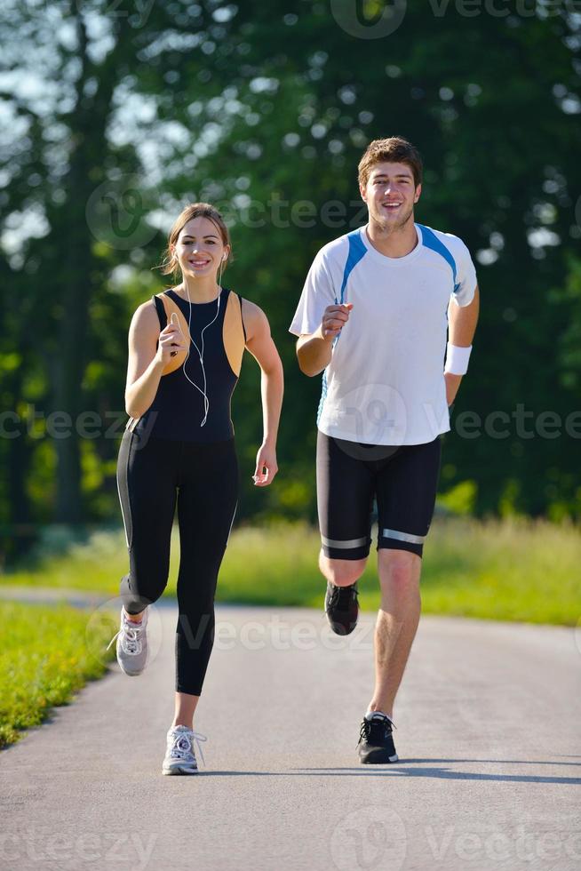 Young couple jogging photo