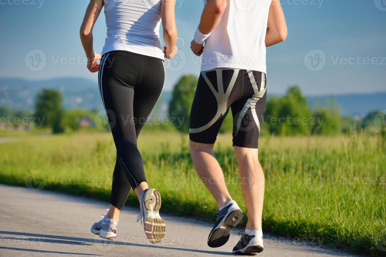 Couple jogging outside photo