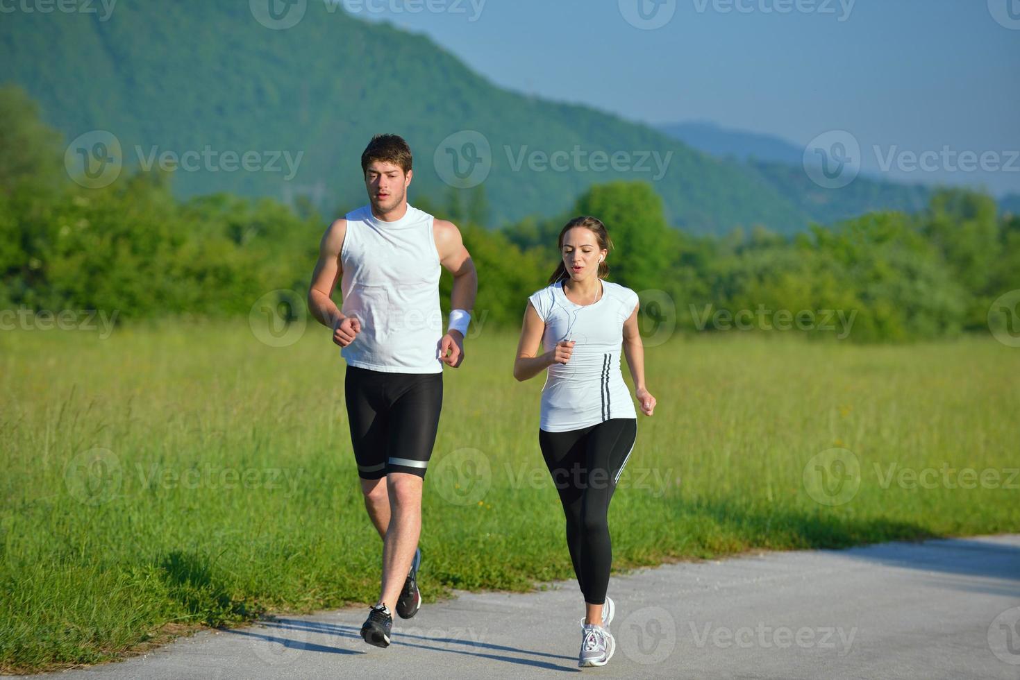 Couple jogging outside photo