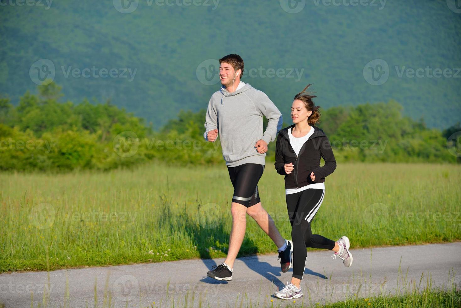 Young couple jogging photo