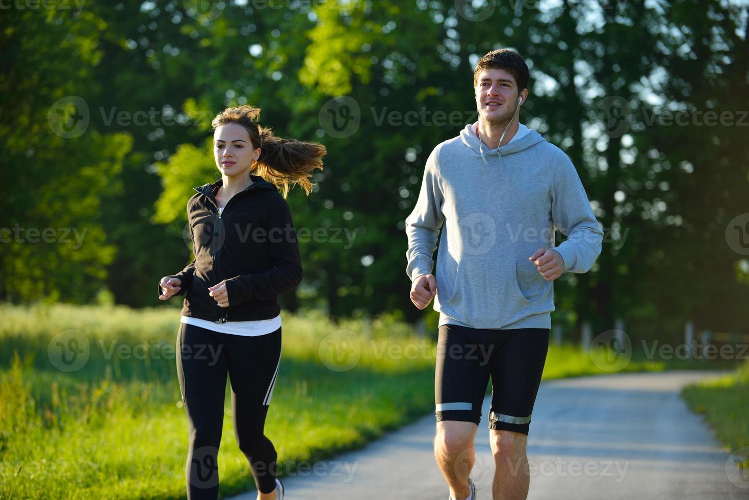 Young couple jogging photo