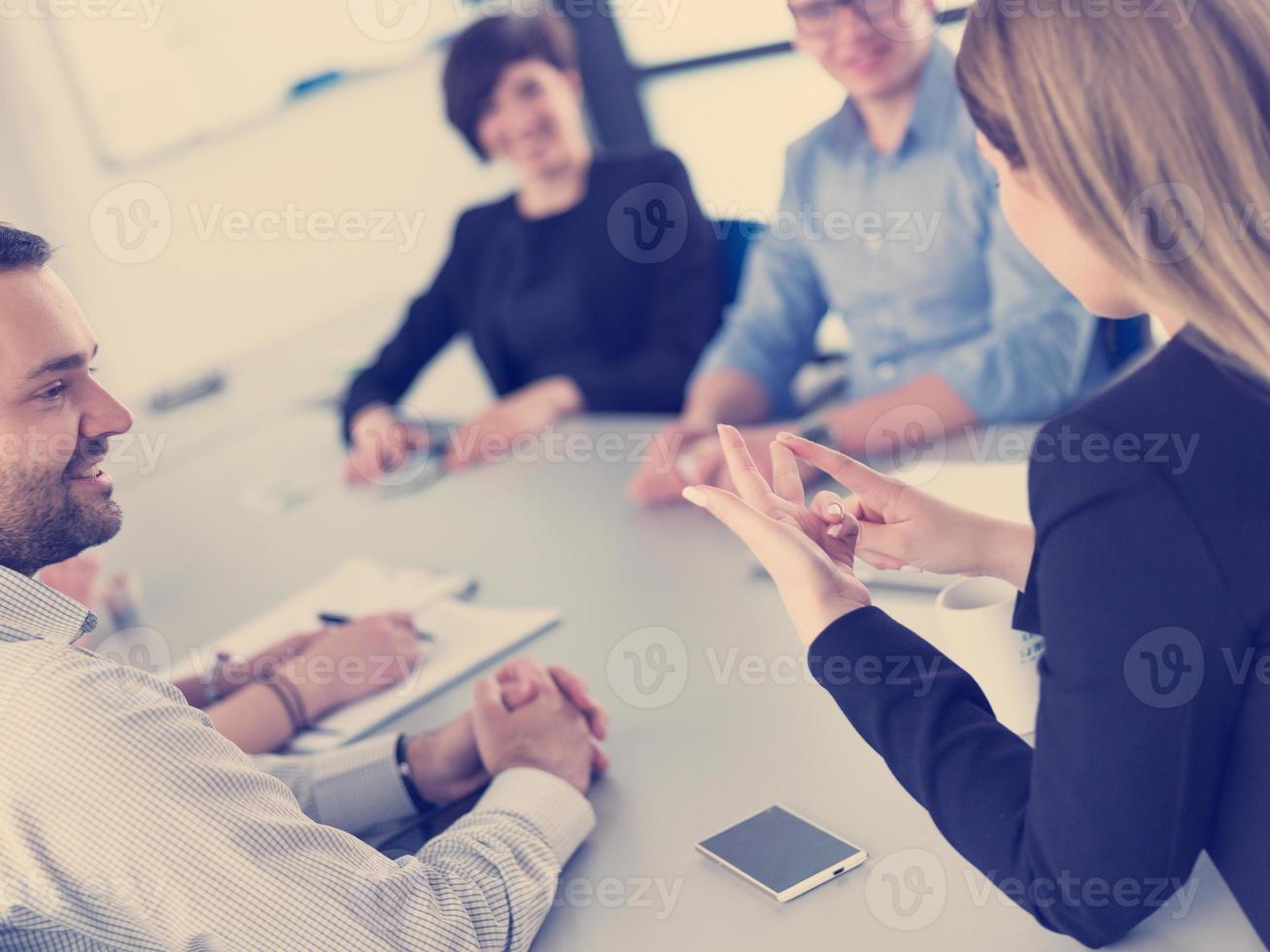 Business Team At A Meeting at modern office building photo