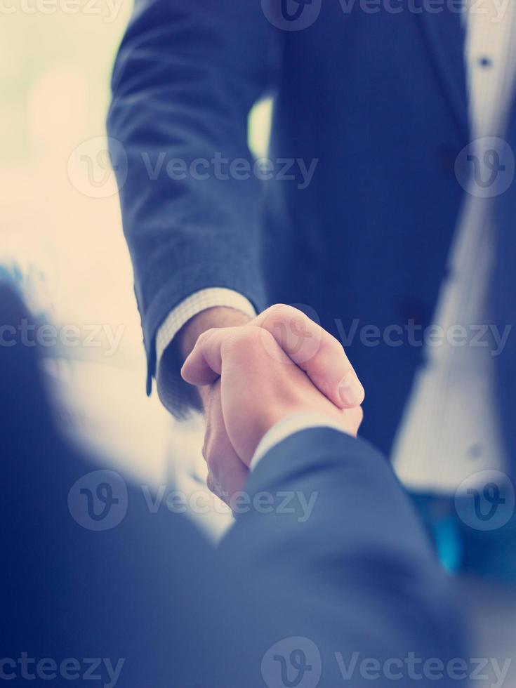 cloasing the deal in modern office interior photo