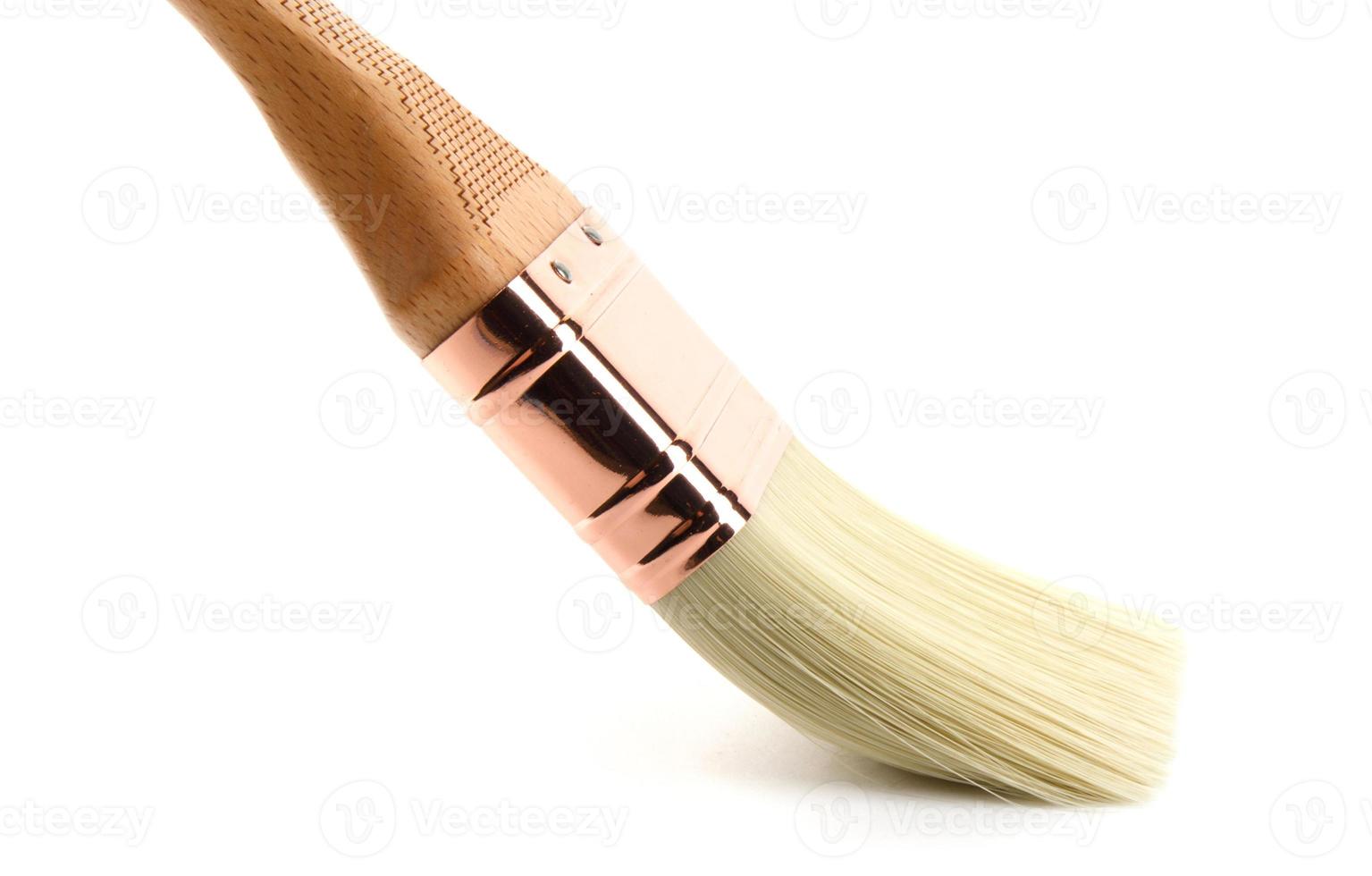 A new beautiful painting brush on a white background. photo