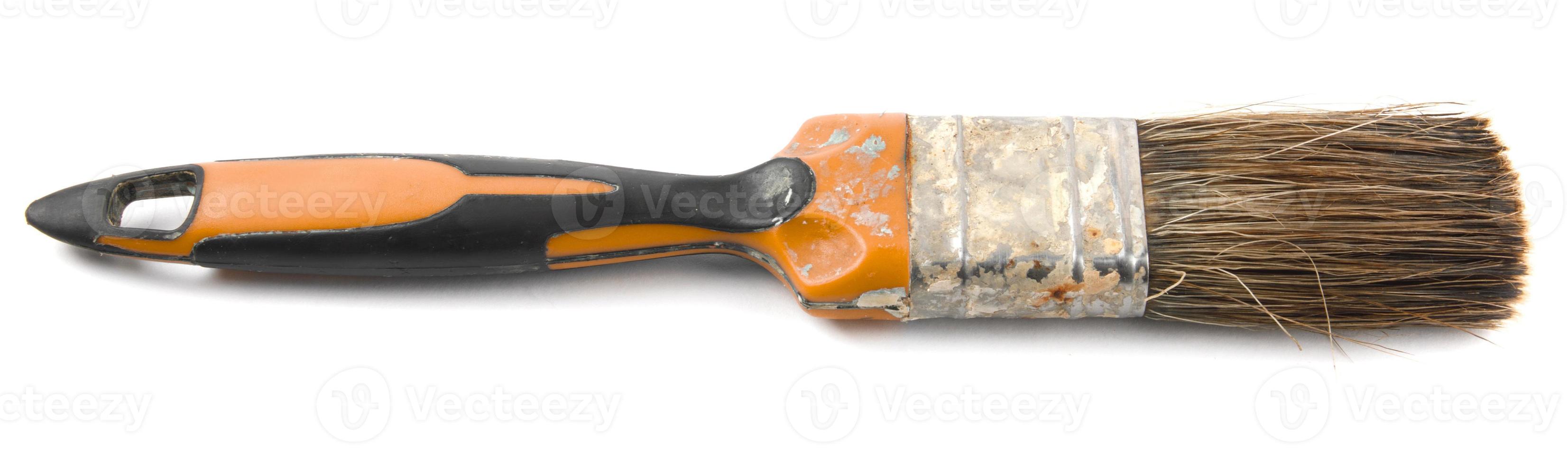 The old painting brush is isolated on a white background. photo