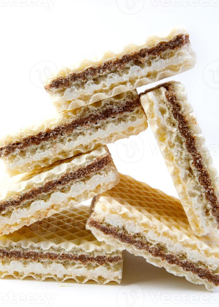 Delicious crisp waffles on a white background. photo