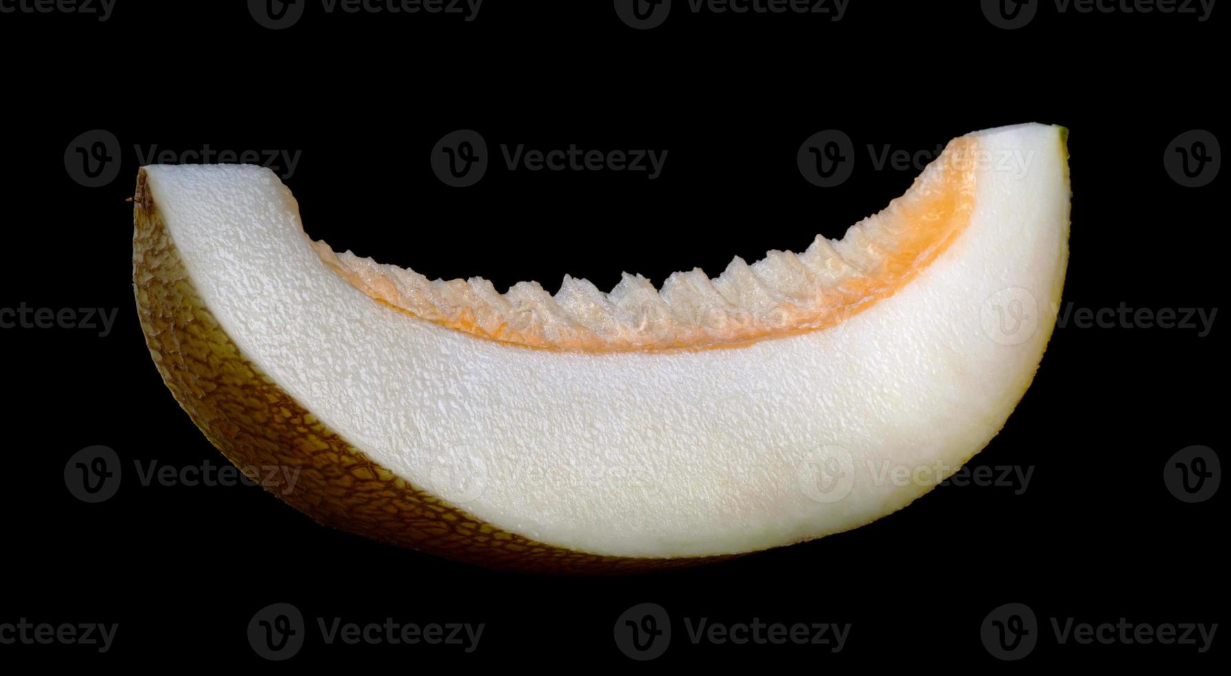 Beautiful slice of ripe melon on a wooden table. photo