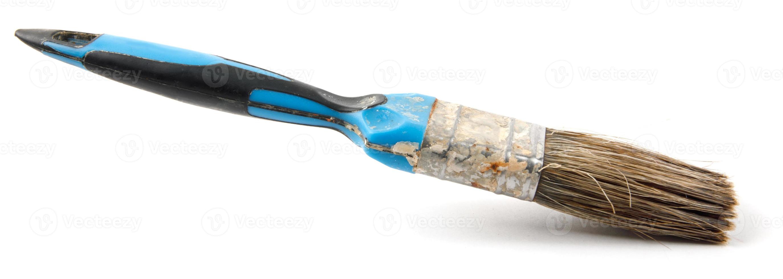 The old painting brush is isolated on a white background. photo